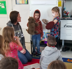 Mrs. Clark in Mr. Gusler's first grade classroom
